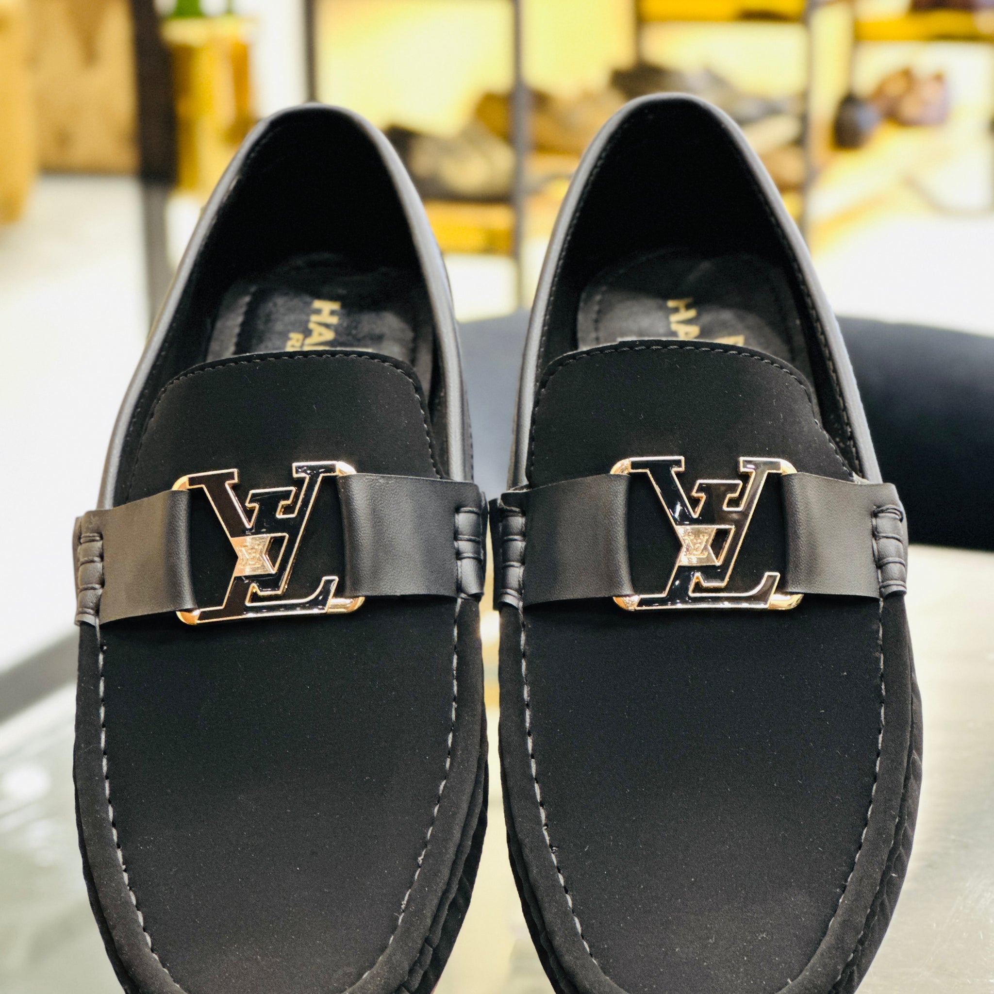 BLACK BUCKLED LOAFERS